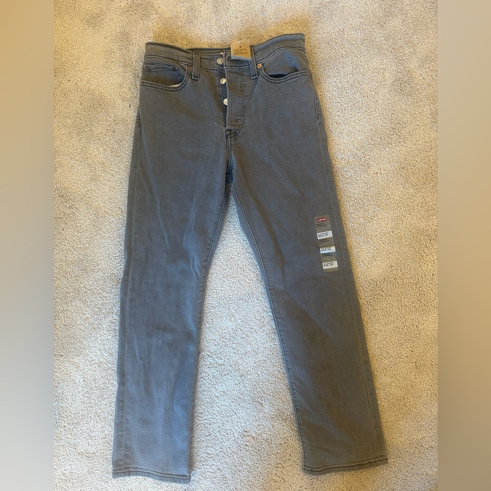 Levi’s, grayish color, NWT, never worn.